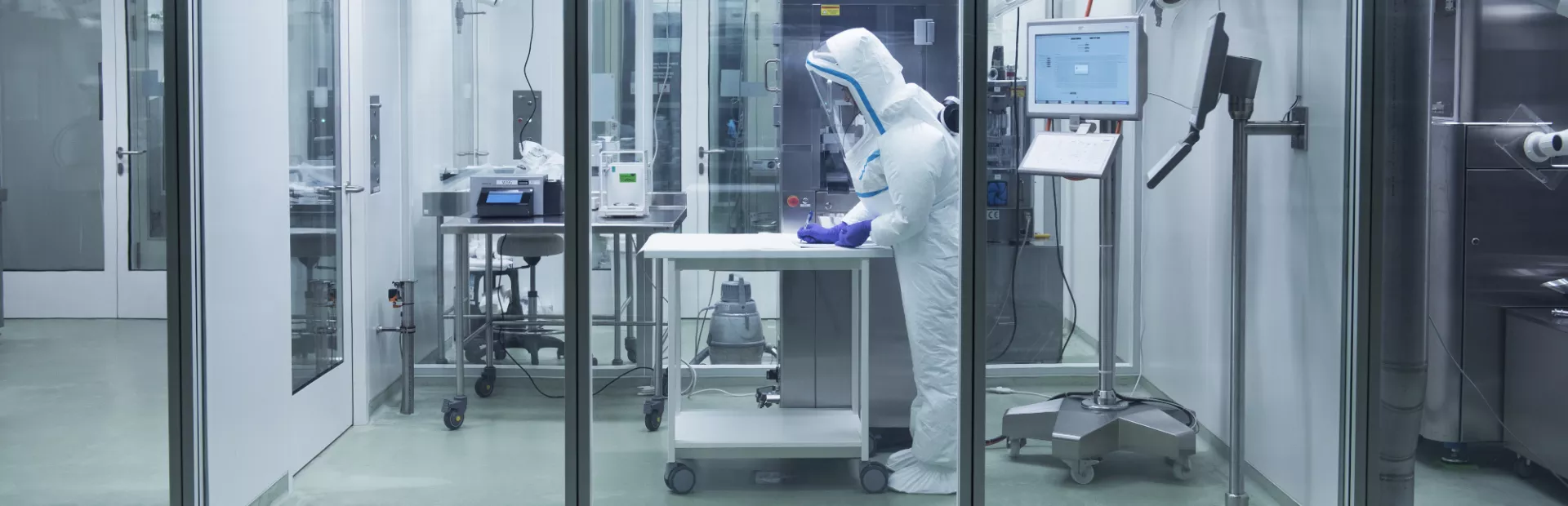 Scientist working with protective suit