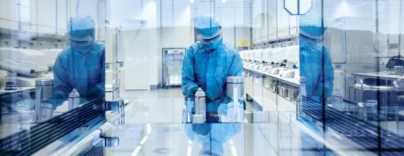 A Cell Processing Specialist at work in Novartis’ new cell and gene production facility in Stein, Switzerland.