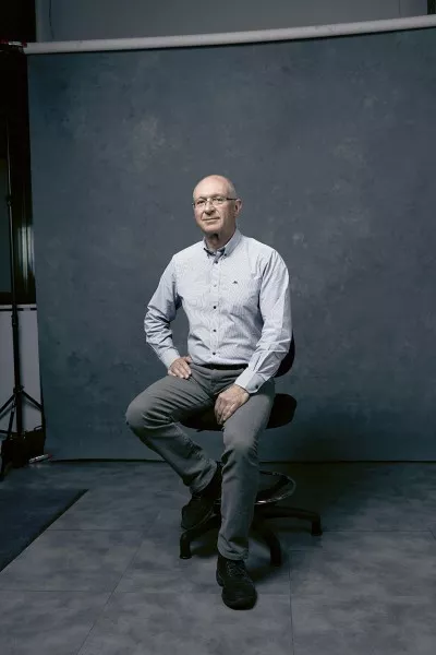 Maurizio Marian, AAA scientist, sitting on a chair