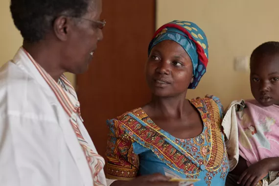 Doctor prescribing medication in Rwanda